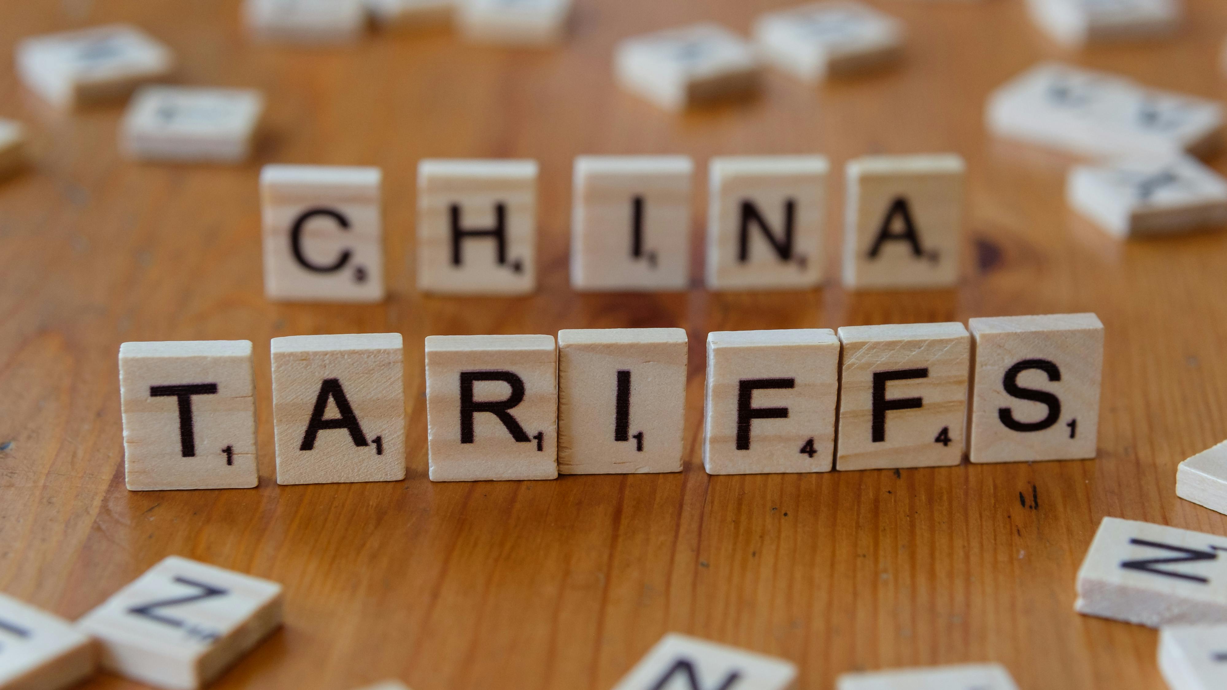 Scrabble letters spelling out the words "China tariffs'