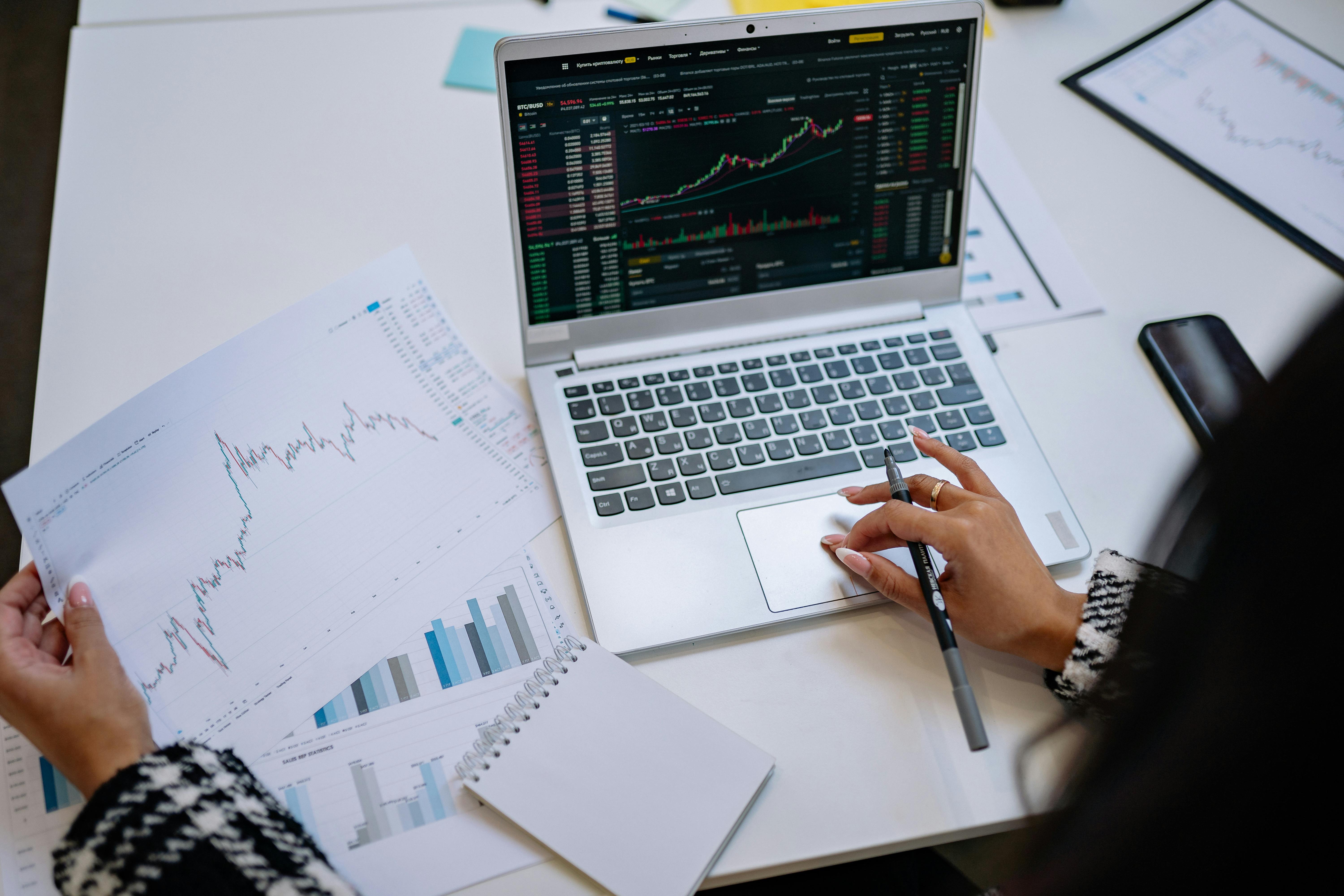 Woman looking at stock market information.
