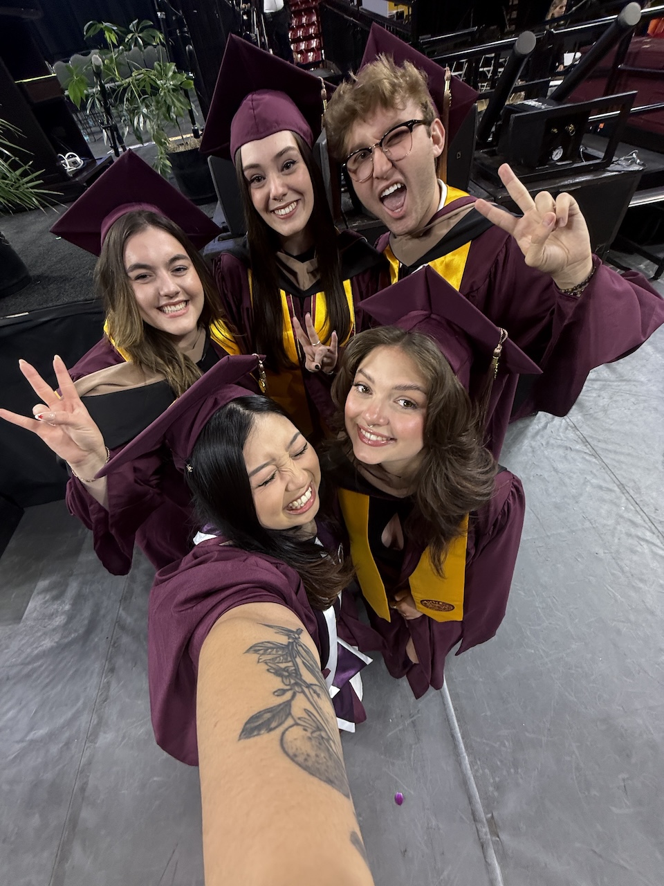 MACC graduate Kailey Shupe with fellow MACC students at ASU graduation
