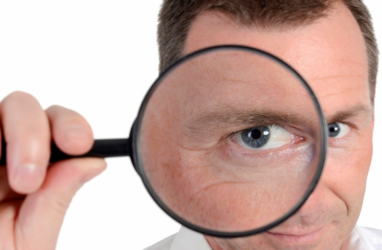Man-magnifying-glass-IDEAS.jpg Man-magnifying-glass-IDEAS.jpg